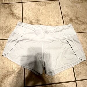 Lululemon speed up shorts in light gray. 4” size 8